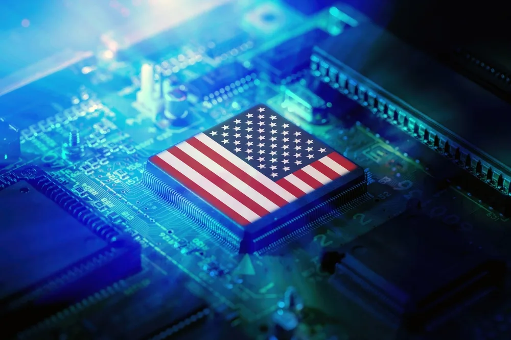 A processor stamped with the US flag seated on a circuit board